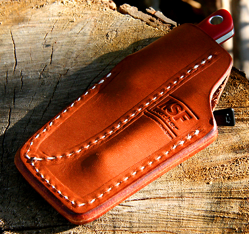 A fixed blade in a pocket sheath